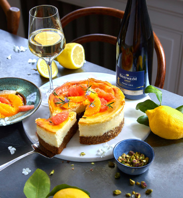 La recette du Cheesecake aux Agrumes et éclats de Pistache & Pinot Gris Exception